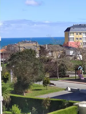 a view of a park with the ocean in the background at Foz, ven y disfruta Galicia in Foz