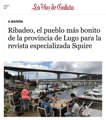 a picture of a marina with people sitting at tables at MODERNO PISO CON LA MEJOR TERRAZA DE RIBADEO Y VISTAS MARAVILLOSAS in Ribadeo