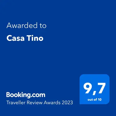 a blue screen with the text awarded to csa time at Casa Tino in Montederramo