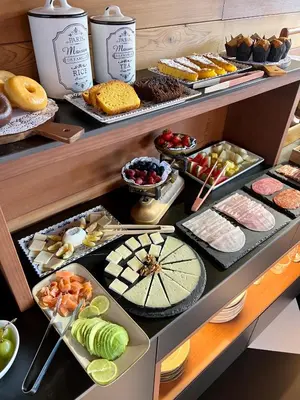 a buffet with many different types of food on display at The Tailor's Garden in Santiago de Compostela