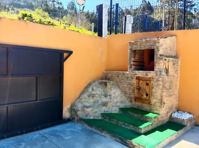 a building with a door and a set of stairs at Casa Carmelo in Viveiro