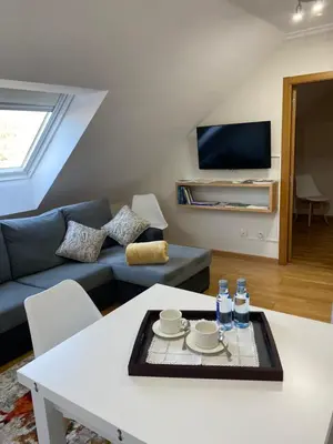 a living room with a couch and a table at O SECRETO in Padrón
