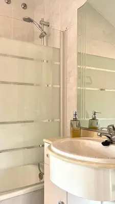 a bathroom with a sink and a shower at Alfonso Vll in Caldas de Reis