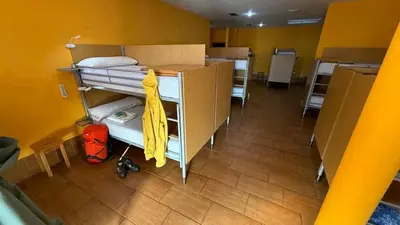 an overhead view of a dorm room with bunk beds at Albergue Lecer Sobrado in Porta