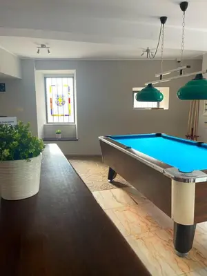 a large room with a pool table in it at Grupo Las Catedrales - Hotel Amadora in Barreiros