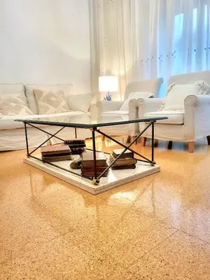 a living room with a coffee table and a couch at Olimphya in Ourense