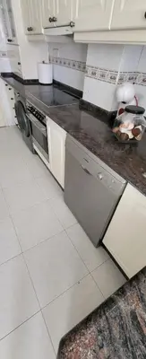 a kitchen with a stove and a dishwasher at Olimphya in Ourense