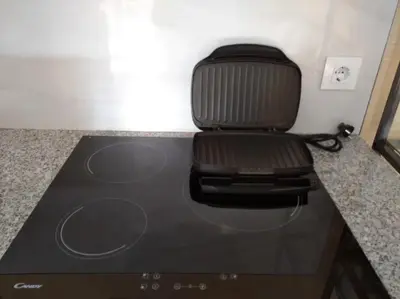 a suitcase sitting on top of a counter at Charming House in Parada with Large Garden in Parada