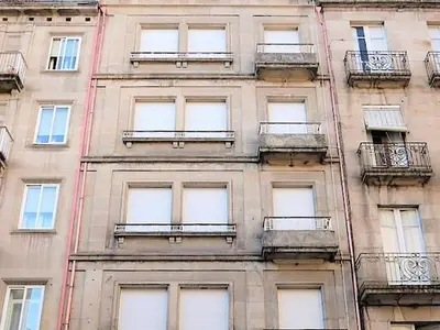 a tall building with balconies on the side of it at Apartment in Ourense near Thermal Baths in Ourense