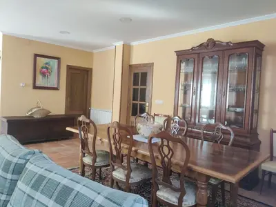 a living room with two couches and a fireplace at Casa a Trepa in Villar de Barrio