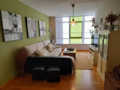 a living room with a couch and a table at NORAY in Ribadeo