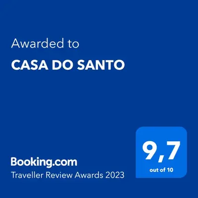 a blue sign with the text awarded to csa do santa at CASA DO SANTO in Santiago de Compostela