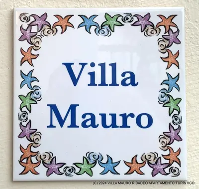 a sign for a villa marina at Villa Mauro Ribadeo Apartamento Turístico in Ribadeo