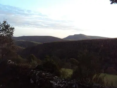 a view of a valley with trees and mountains at Casa de Lucas in Fonfría