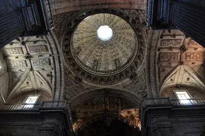 a large building with a clock on the ceiling at Casa Regente in O Viso