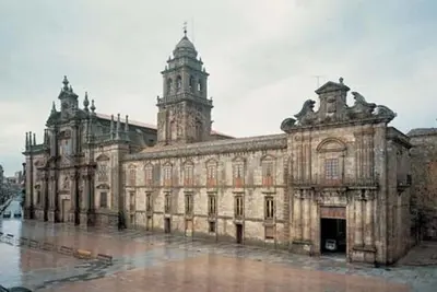 an old building with a clock tower on top of it at Casa Regente in O Viso
