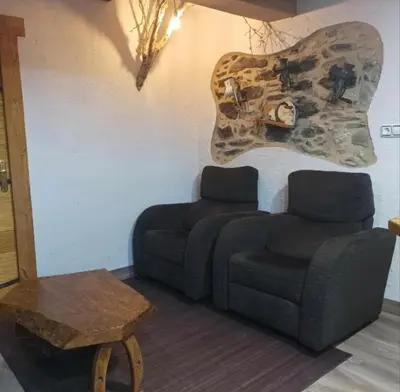 a living room with a couch and a table at O Viraventos in Betanzos