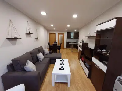 a living room with a couch and a table at Casa Tarrazo in Monforte de Lemos