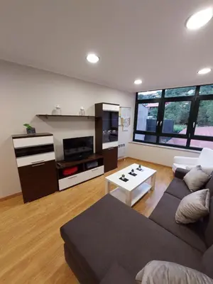 a living room with a couch and a table at Casa Tarrazo in Monforte de Lemos