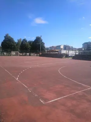 a tennis court with a heart drawn on it at Estudio. Sada, A Coruña. in Sada