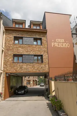 a car parked in front of a building at Apartamentos Casa Paulino in Taramundi