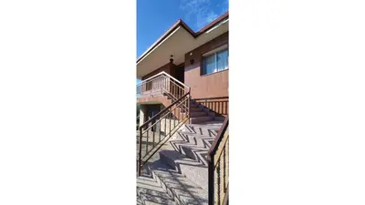 a set of stairs leading up to a building at Casa Meri in El Espino