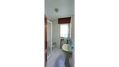 a bathroom with a sink and a mirror at Casa Meri in El Espino