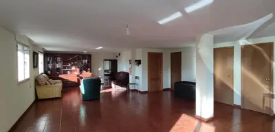a living room with a couch and a table at Casa Meri in El Espino