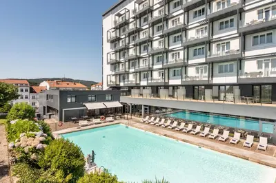 an overhead view of a hotel with a large swimming pool at Exe Peregrino in Santiago de Compostela