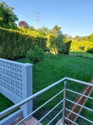 a view of a yard with a fence at Apartamento Vistas Pedrido in Paderne