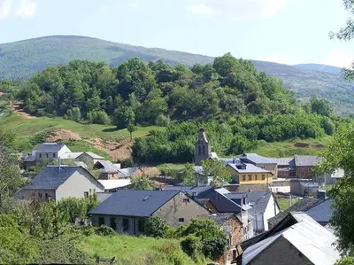 a small village with a church on a hill at La Gándara Casa Rural in San Justo de Cabanillas
