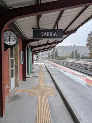 a train station with a clock on the platform at Casa-Nova Centro in Sarria