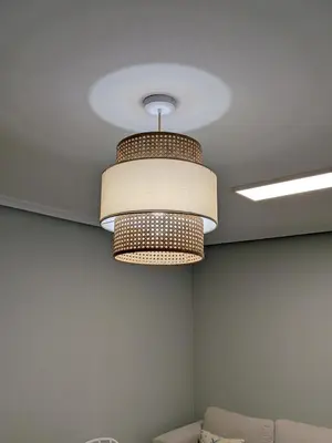 a chandelier hanging from the ceiling in a room at Casa-Nova Centro in Sarria