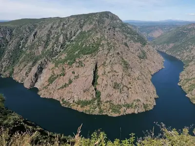 an aerial view of a mountain with a lake at Carballo Alenza in Sistín