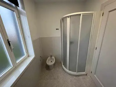 a bathroom with a shower and a toilet at Apartamento A in Irijoa