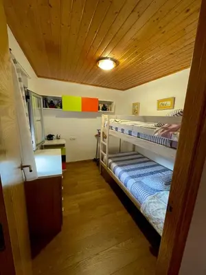 a room with two bunk beds in a house at A Casa do Abuelo in Ourense