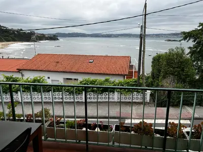 a balcony with a view of the water at Oktheway Perbes Vintage 2 in Perbes