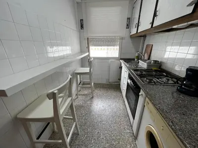 a kitchen with a stove and a counter top at Oktheway Perbes Vintage 2 in Perbes