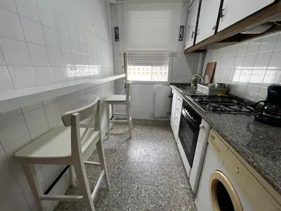 a kitchen with a stove and a counter top at Oktheway Perbes Vintage 2 in Perbes