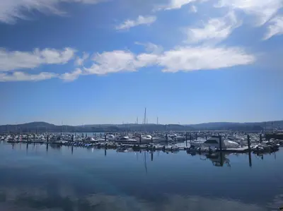 a marina filled with lots of boats on the water at Céntrico Estudio in Sada