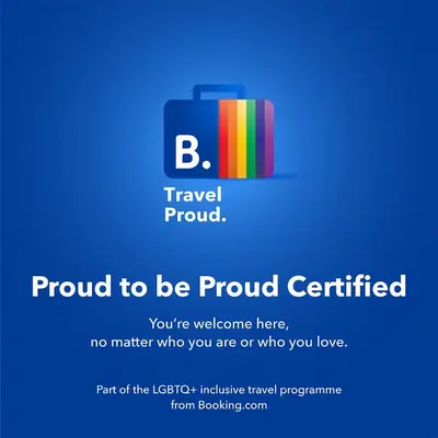 a sign that says proud to be proud certified with a suitcase at LOFT CON TERRAZA en el centro de Santiago de Compostela VUTCO 07320 in Santiago de Compostela
