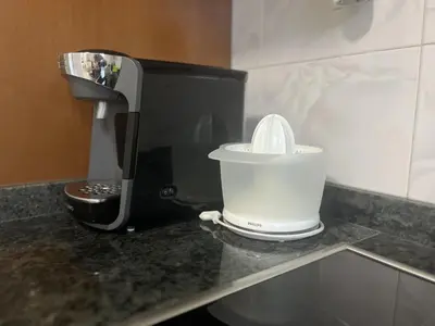 a coffee maker sitting on top of a counter at A Casiña - Casa Rural en la Ribeira Sacra, Galicia in Ourense