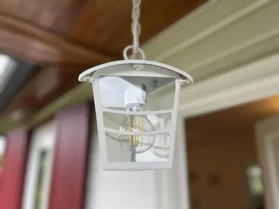 a light fixture hanging from a ceiling at A Casiña - Casa Rural en la Ribeira Sacra, Galicia in Ourense