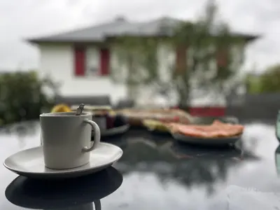 a cup of coffee sitting on a table at A Casiña - Casa Rural en la Ribeira Sacra, Galicia in Ourense