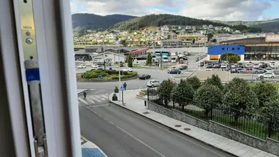 a view from a window of a city with a street at Vial Sol in Viveiro