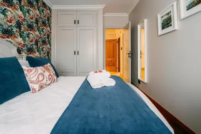 a room with a bed with two towels on it at PENSIÓN CALDEA in Caldas de Reis