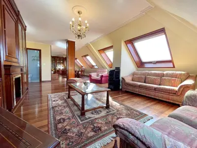a living room with a couch and a table at The Cliffs - Milamarina in Viveiro