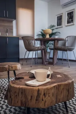 a coffee table with a cup on top of it at Beche EcoCamp in Santa Eulalia