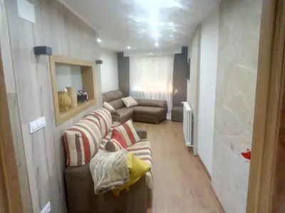 a living room with couches and a couch at Casa o Cantón in Berredo