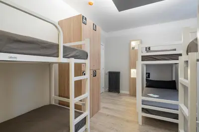 a dorm room with bunk beds in it at Albergue Alda Pilgrim Ponferrada in Ponferrada